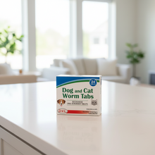 Dog and Cat Worm Tabs box roundworm oral dewormer tablets by Dominion Veterinary Laboratories on white background.