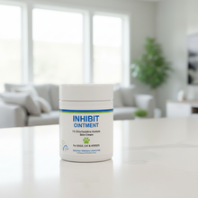 Inhibit Ointment 1 percent chlorhexidine acetate skin cream jar for dogs, cats, and horses by Dominion Veterinary Laboratories on white background.